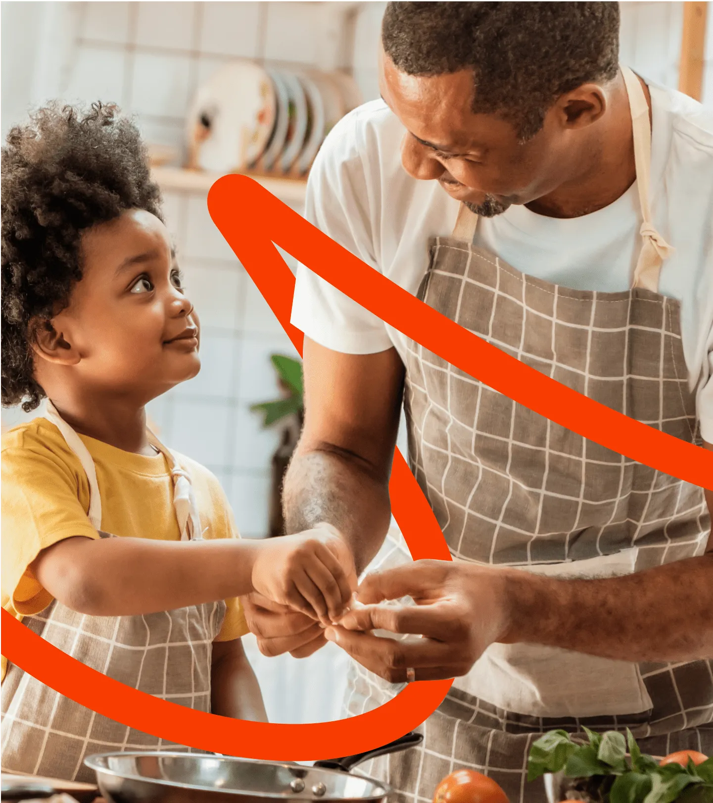 Happy dad cooking with his child